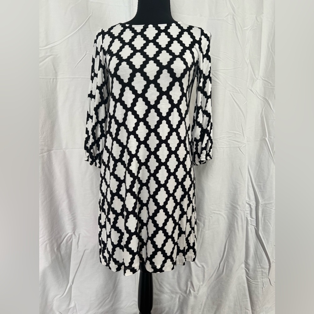 Great grab and go dress! Style with cute sandals or tennies for easy comfort!